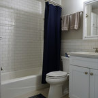 Water tower inspired home master bath suite - Rustic 