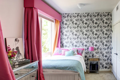Example of a small trendy girl carpeted and beige floor kids' room design in Boise with white walls