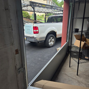 (2) New garage doors & openers