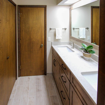 Master Bath with Knotty Alder Vanity and Updated Surround Around Tub