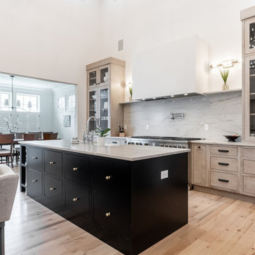 Delafield Elegance: Glass Doors & Black Islands