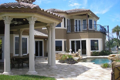 Mediterranean exterior home idea in Tampa