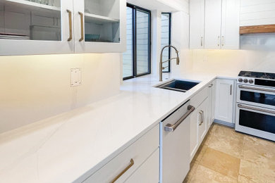 Inspiration for a l-shaped kitchen remodel in Other with shaker cabinets