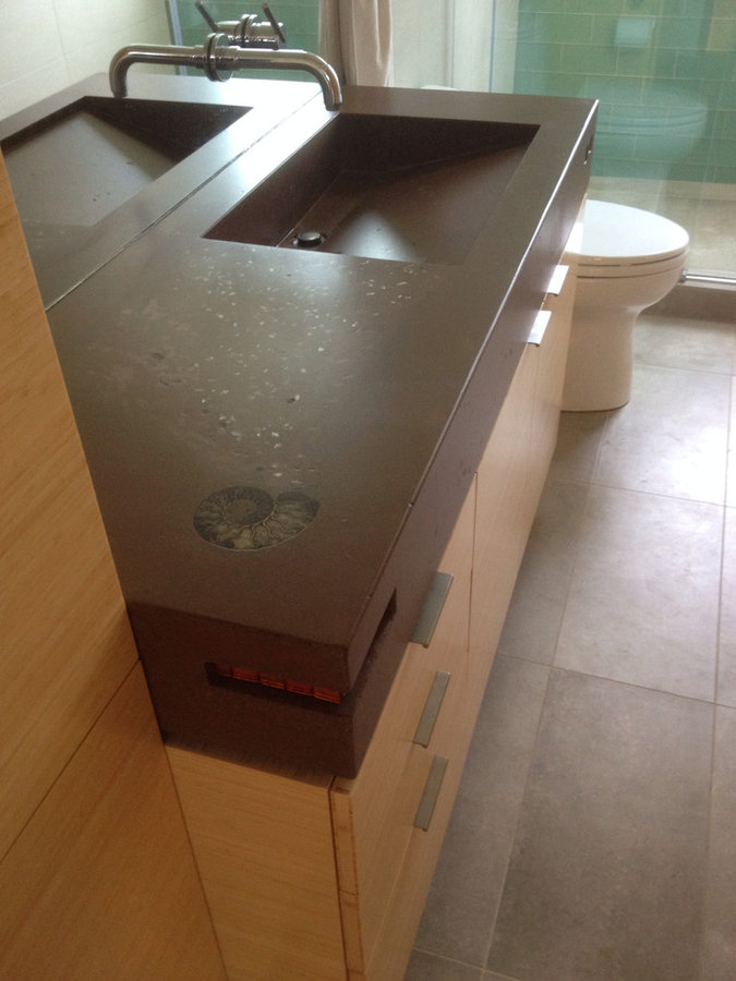 Concrete vanity top with integral sink