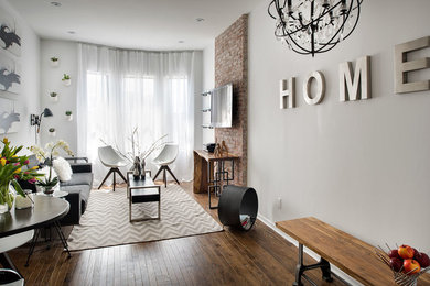 Large minimalist formal and open concept living room photo in New York with white walls and a wall-mounted tv