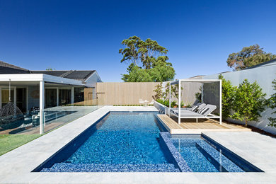 Photo of a beach style pool in Melbourne.