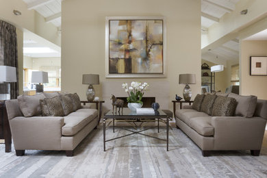 Living room - large transitional open concept light wood floor living room idea in San Francisco with beige walls, a standard fireplace and a stone fireplace