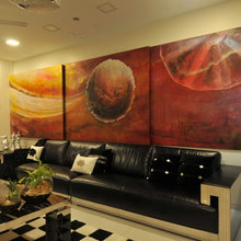 painting behind sofa