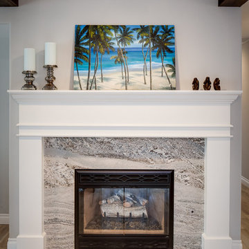 After: New facing and mantel on existing gas fireplace.