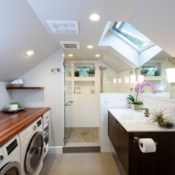 Maximizing Space in a Master Bathroom and Laundry with Light and Materials