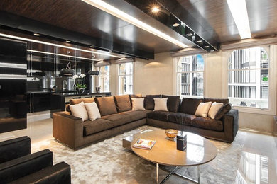 Inspiration for a large contemporary open plan living room in London with beige walls, marble flooring, no fireplace and a built-in media unit.