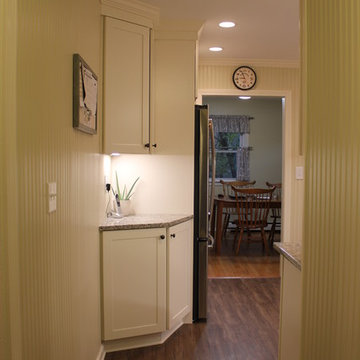 New upper and lower corner cabinet to fill that spot!