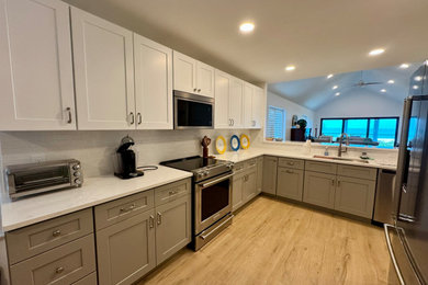 Example of a beach style kitchen design in Tampa