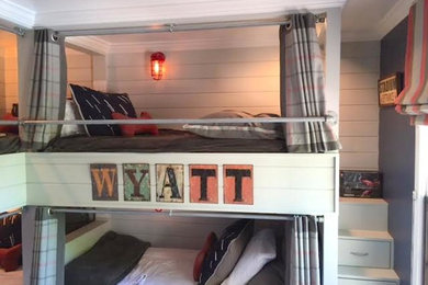 Example of a mid-sized transitional boy kids' room design in Nashville with gray walls