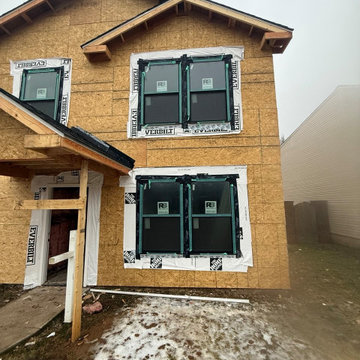 Wood composite and vinyl siding exterior