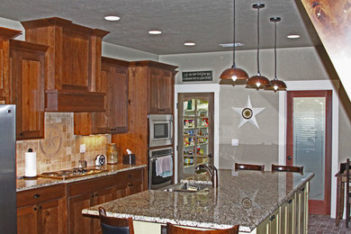 Example of a mountain style kitchen design in Austin