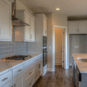 Custom Newport w/ side-load garage and master w/ sitting room