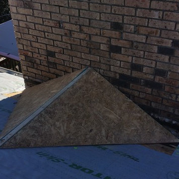 Building a Cricket behind a chimney.