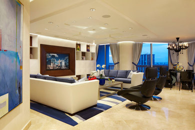 Inspiration for a contemporary open concept living room remodel in Miami with a media wall