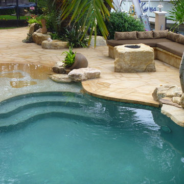 Backyard pool patio, seating area and fire pit