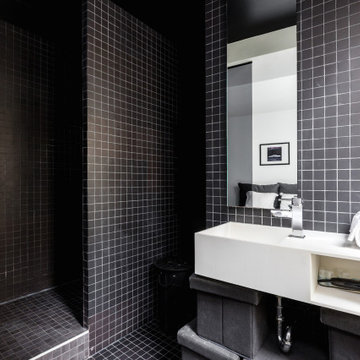 This black bathroom exudes Parisian sophistication