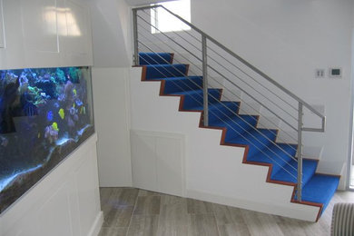 Inspiration for a contemporary staircase remodel in Orange County