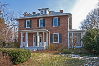 Example of a classic exterior home design in Other