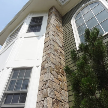 Combining Colonial Tan Natural Stone with Olive Green Siding