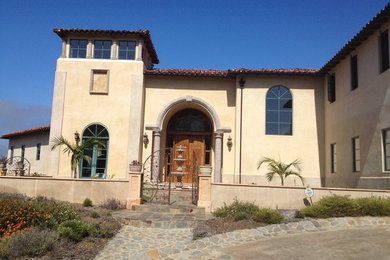 Tuscan exterior home photo in San Diego