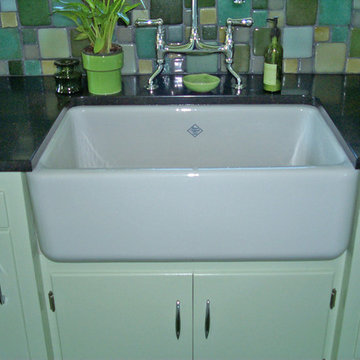 Functional, single-basin sink anchors this kitchen remodel