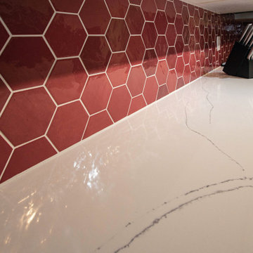 Reface Kitchen Cabinets with Red Hexa Tile Backsplash and Quartz Countertop