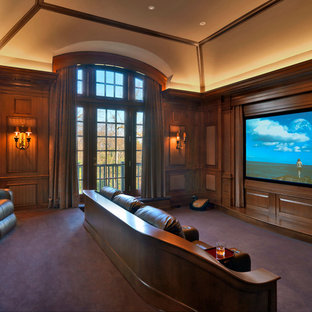 Inspiration for a traditional home cinema in Boston with a projector screen and purple floors.