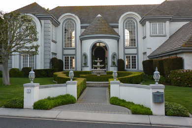 Inspiration for an expansive transitional exterior in Orange County.