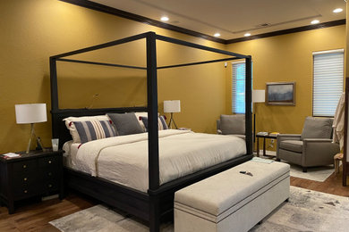 Inspiration for a transitional master medium tone wood floor bedroom remodel in Albuquerque