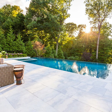 Luxury vanishing edge swimming pool and outdoor living area Ridgewood NJ