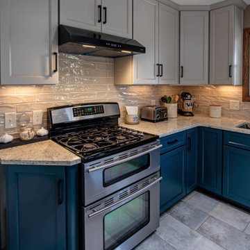 Two Tone Teal and Cream Kitchen with Romano White Quartz Countertop