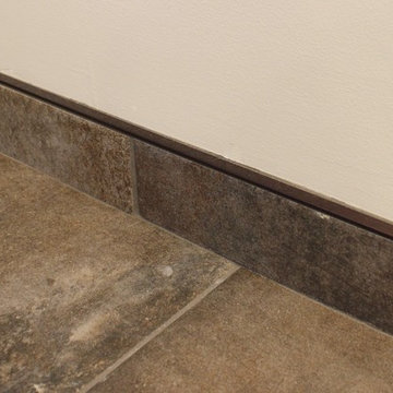 Moline, IL Bath Remodel With Gray Stained Cherry Vanity and Pebble Tiled Shower