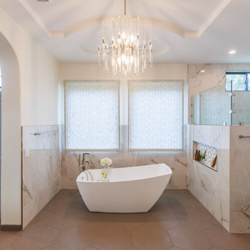Symmetrical Soaking Tub with Statement Chandelier