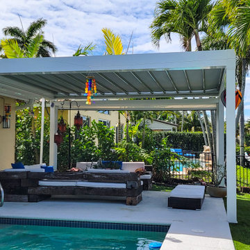 Retractable Pergola with Motorized Screens on Poolside Patio