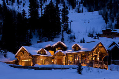 Inspiration for a timeless stone house exterior remodel in Denver