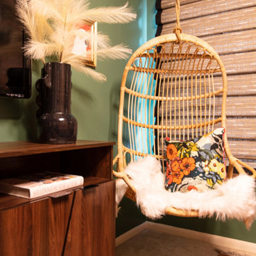 Hanging Rattan Chair in Tropical Guest Room