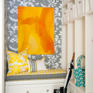 Example of a transitional dark wood floor mudroom design in Little Rock with multicolored walls