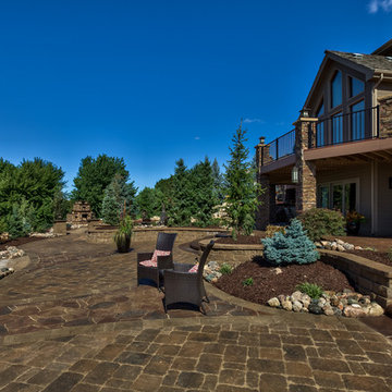 Open Air Patio and Reflection Space in Rocky Mountain Home Landscape