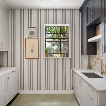 Contemporary Laundry and Mudroom with Sage Herringbone Tile