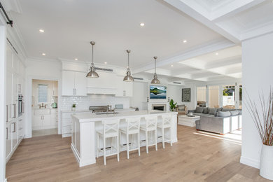 This is an example of a beach style kitchen in Sydney.