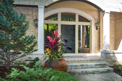 Inspiration for a transitional exterior home remodel in Other