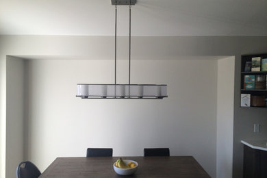 Example of a mid-sized minimalist dining room design in Other