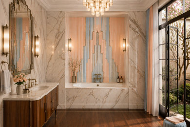 Inspiration for a large transitional kids' pink tile and porcelain tile brown floor, single-sink and exposed beam drop-in bathtub remodel in Los Angeles with furniture-like cabinets, dark wood cabinets, a drop-in sink, marble countertops and white countertops