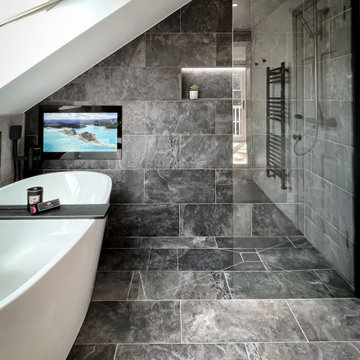 Luxurious Loft Bathroom with Freestanding Tub and Skylight Design