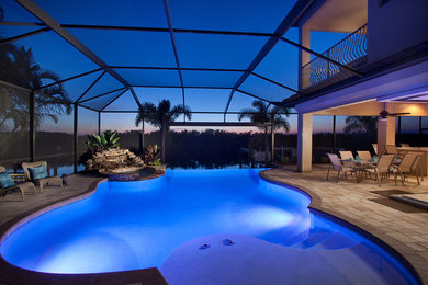 Inspiration for a transitional pool remodel in Tampa